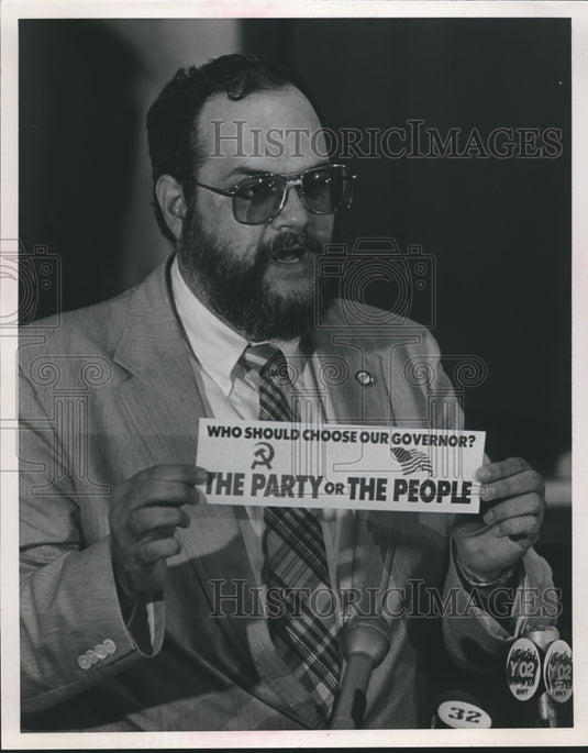 1986, Bill Baxley's lawyer, Ed Still, with misleading Bumper Sticker - Historic Images
