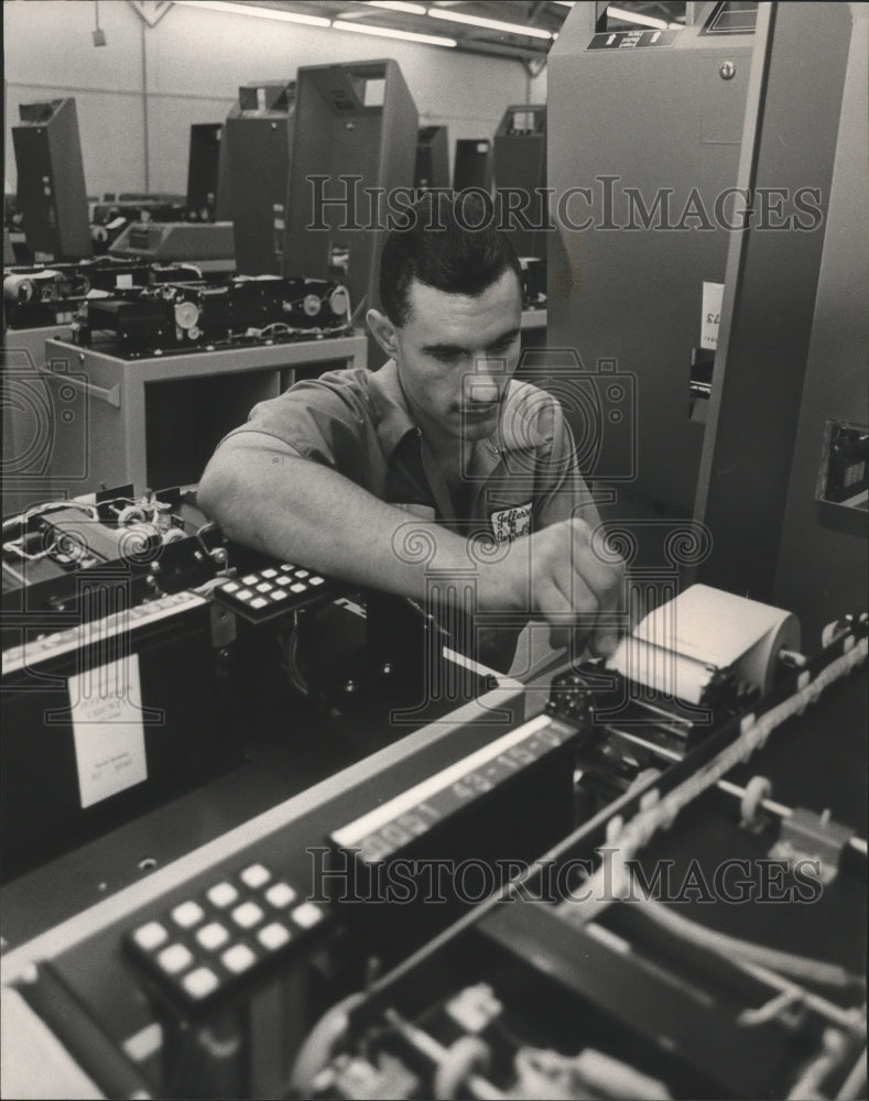 1984, Evan Hill Works on Voting Machine - abna26285 - Historic Images