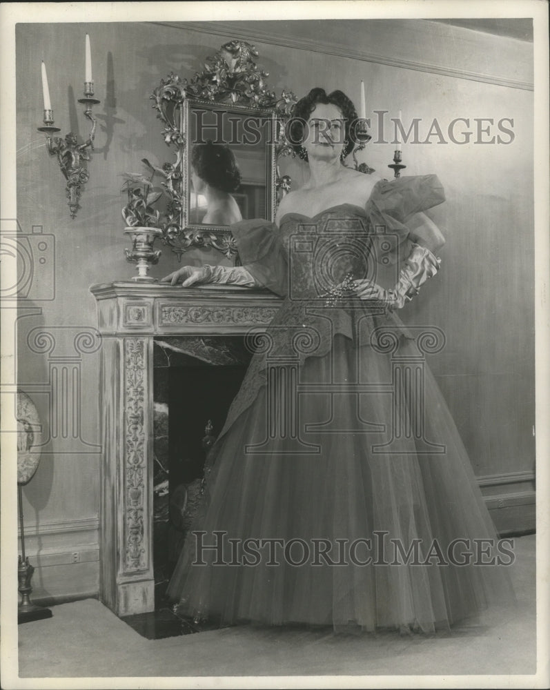 1953 Press Photo Mrs. Morris Bush, standing in front of fireplace - abna26507-Historic Images