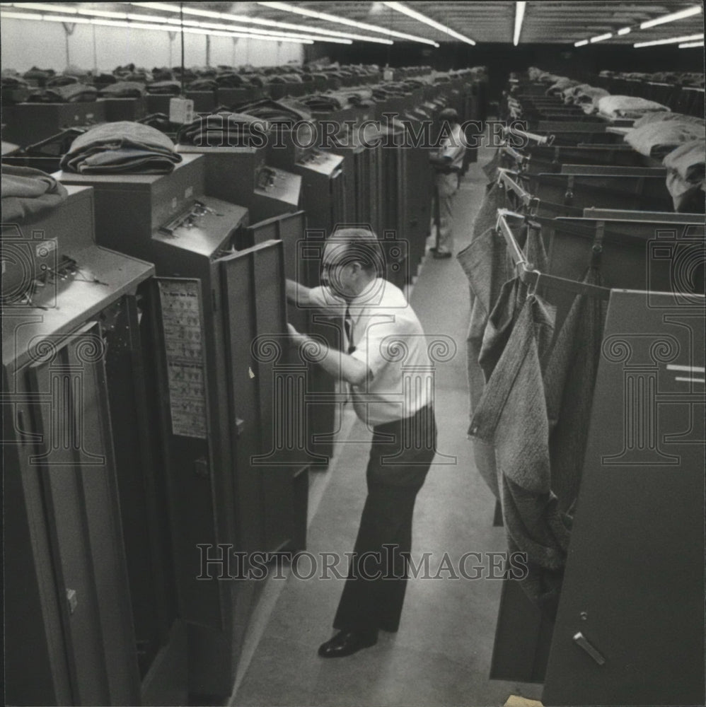 1980 Jackson and Curtis Haygood inspect voting machines, Alabama - Historic Images