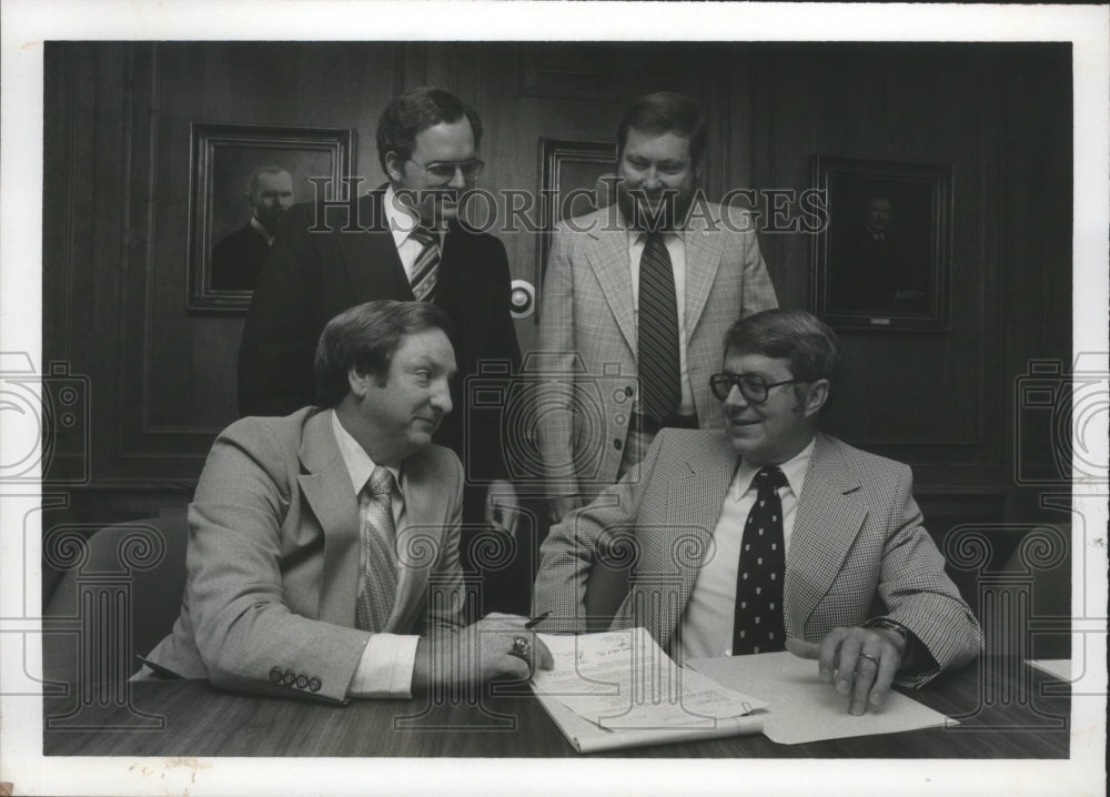 1978, Ben Clements, J. Brindley, discuss admissions for their college - Historic Images