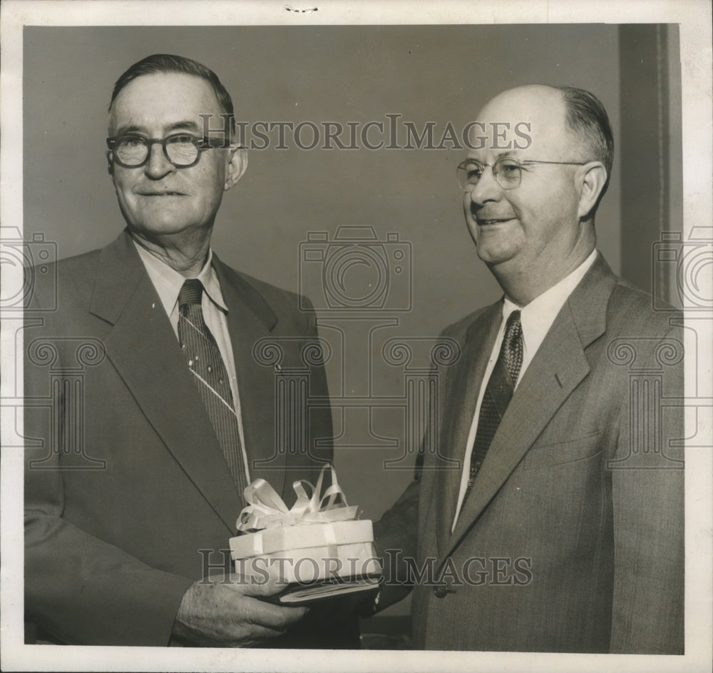 1954, Clifford B. Walker, left, received a gift from S. E. Southard - Historic Images