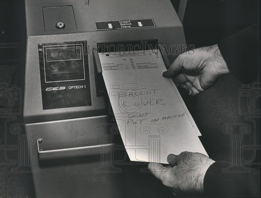 1984, Electronic Voting - Inserting Ballot in Machine for Tabulation - Historic Images