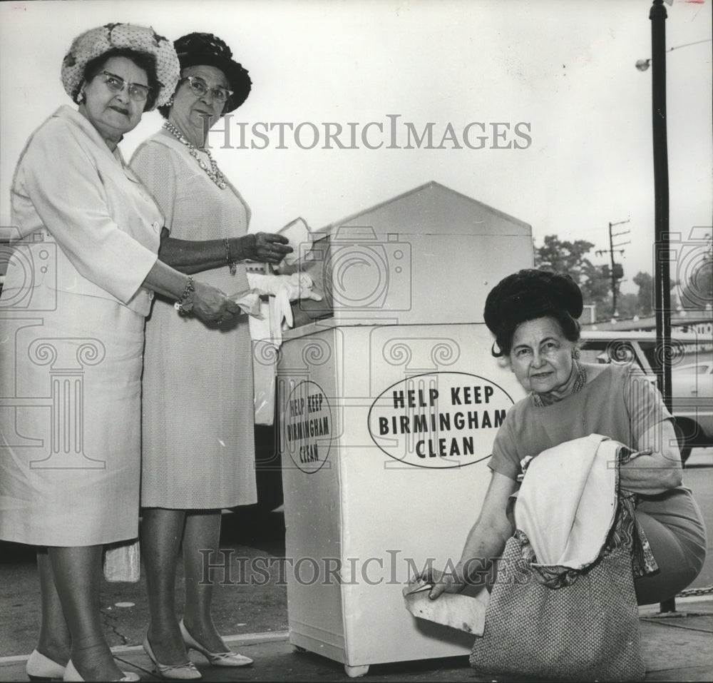 1966 Mrs. Roseman and other beside Birmingham trash can - Historic Images