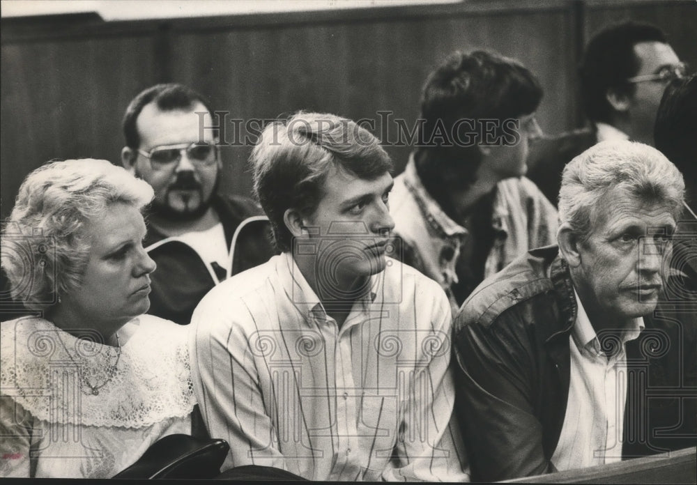 1989, Scott Davis with his parents in Marshall County Courthouse - Historic Images