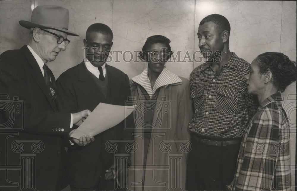 1954, Housing Authority Hugh Denman hands checks to property owners - Historic Images