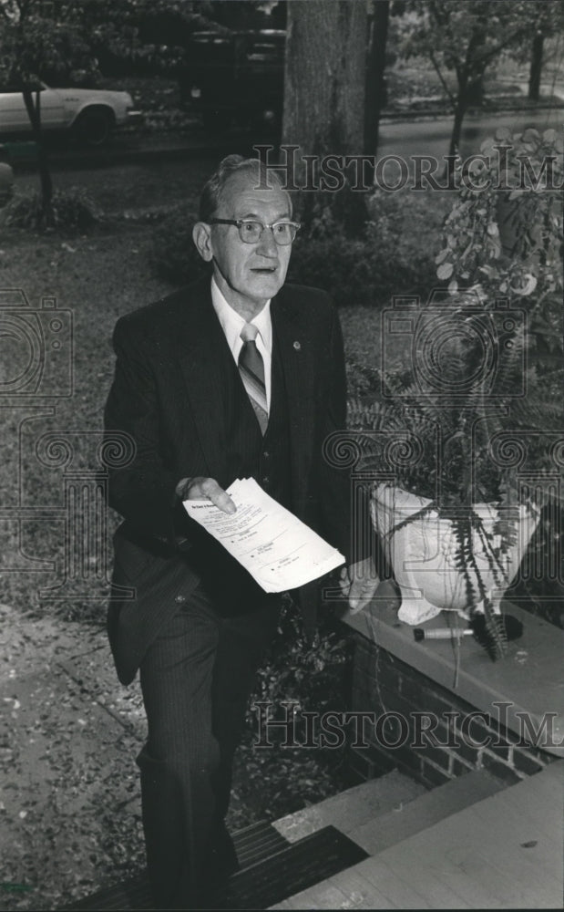 1982, Woodlawn Candidate Ralph Fletcher hand-delivers his ballots - Historic Images