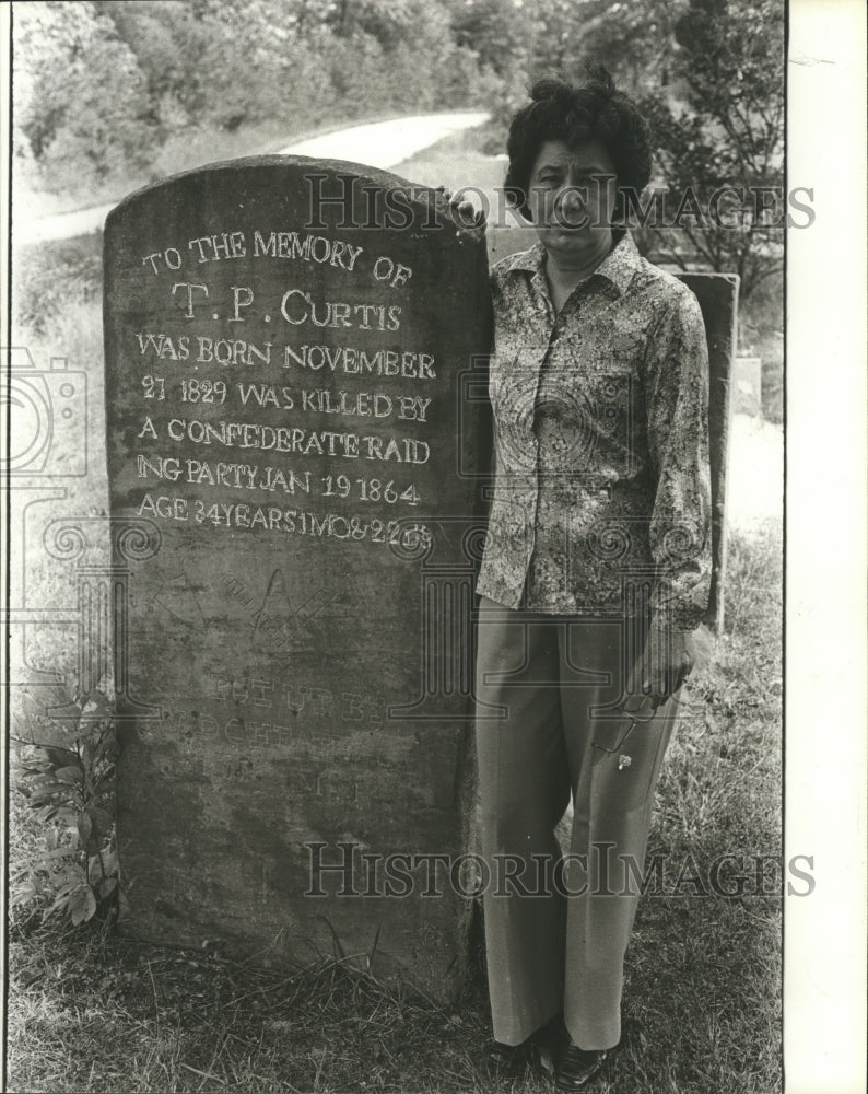 1979, Historian, Author Wynelle Dodd, beside gravestone in Cemetery - Historic Images