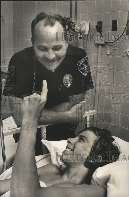 1975, Officer Byer and David Key, boy he pulled from East lake - Historic Images
