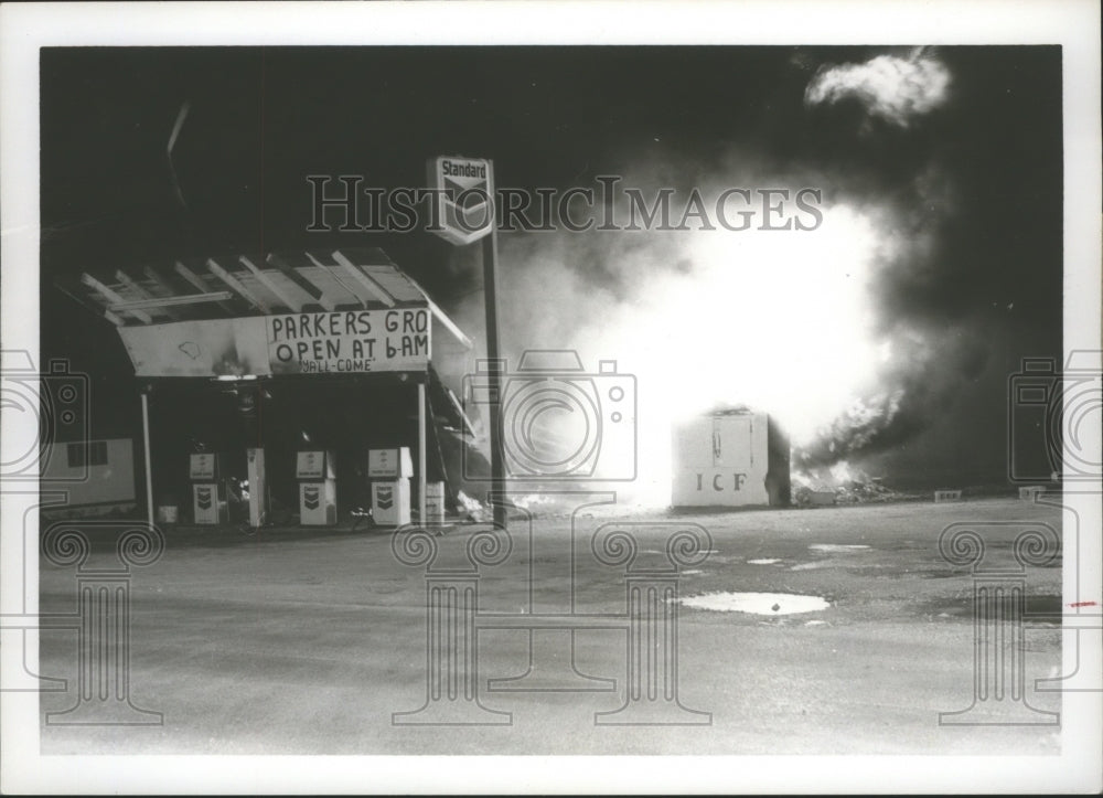 1976 Fire flared up, above, at Parker&#39;s Grocery and Service Station - Historic Images