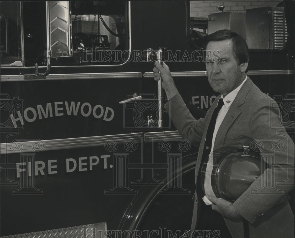 1983 Homewood Fire Chief Albert Evans beside fire truck - Historic Images