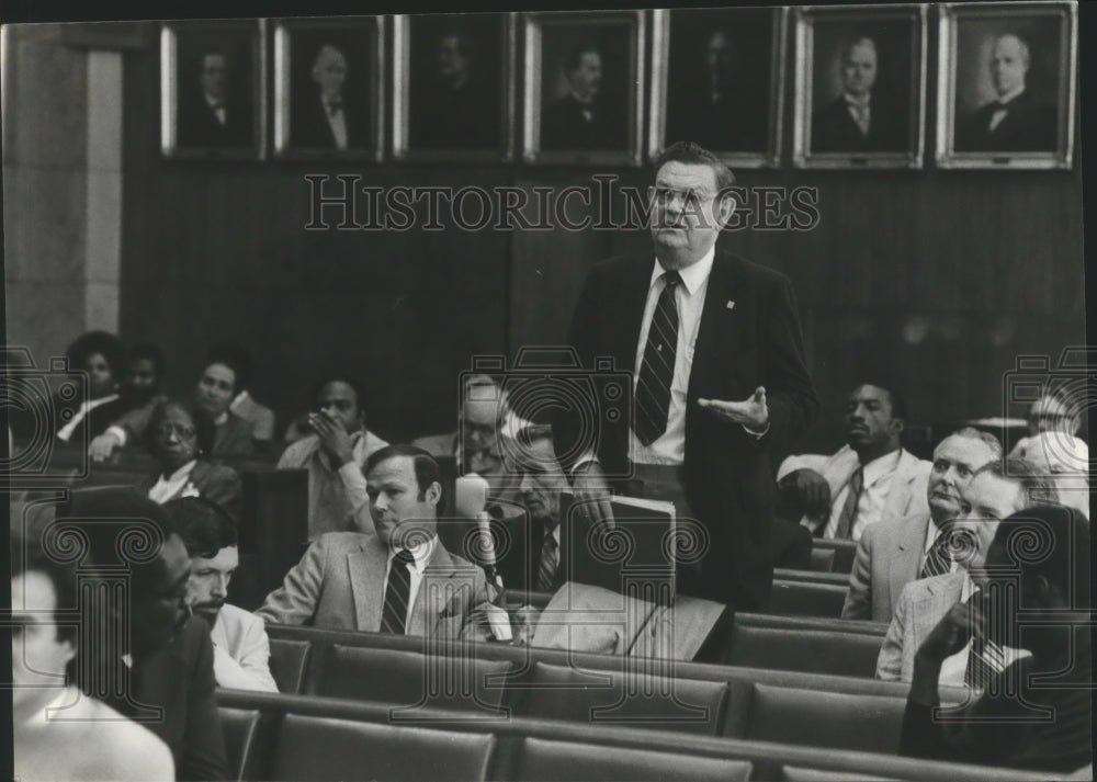 1982, Raiford Ellis, standing, speaking as others listen - abna28492 - Historic Images