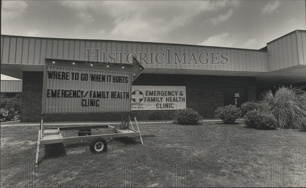 1983, Photo sign in front of Alabama Emergency & Family Health Clinic - Historic Images