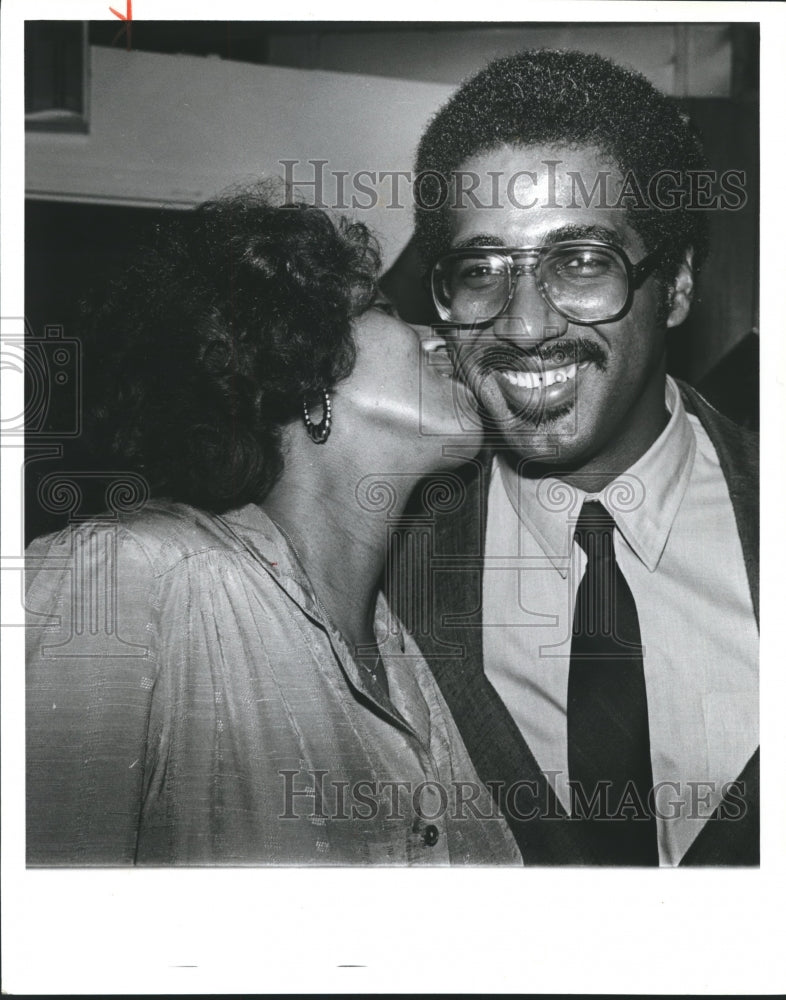 1981, Birmingham City Councilman William Bell receives kiss from wife - Historic Images