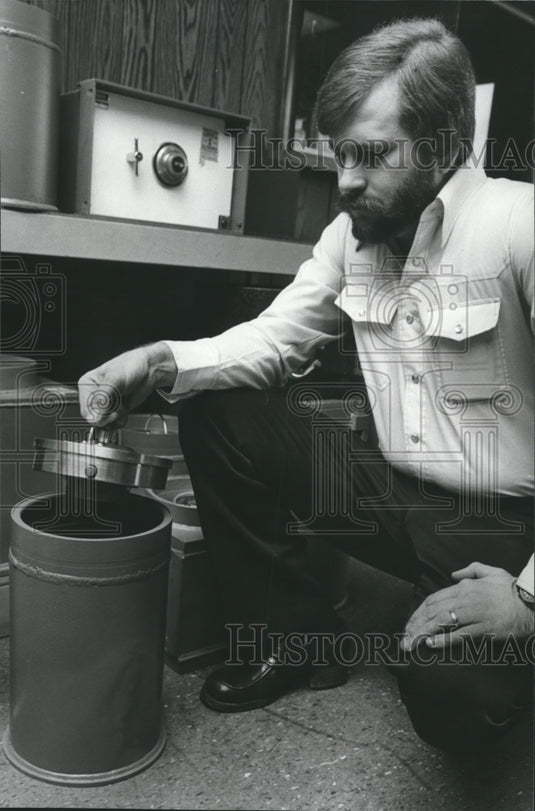 1980, Ron Roegner shows a home safe, Alabama - abna29204 - Historic Images