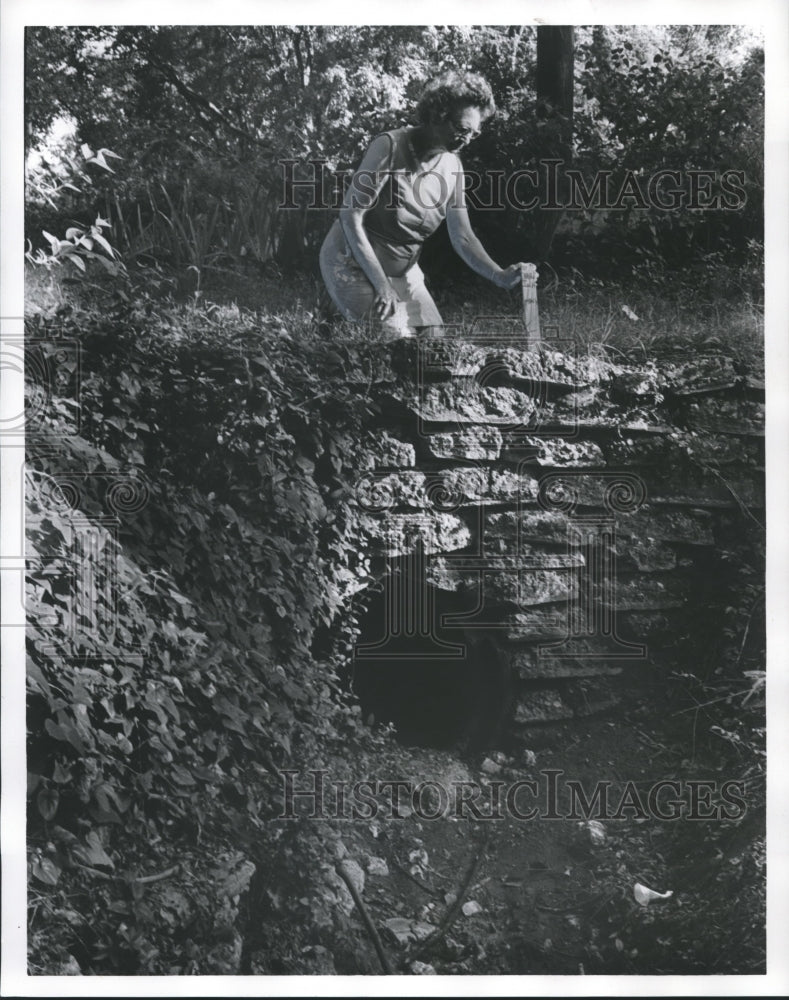 1977 Mrs. O&#39;Herron in Birmingham, Alabama Ditch with pipe marker - Historic Images