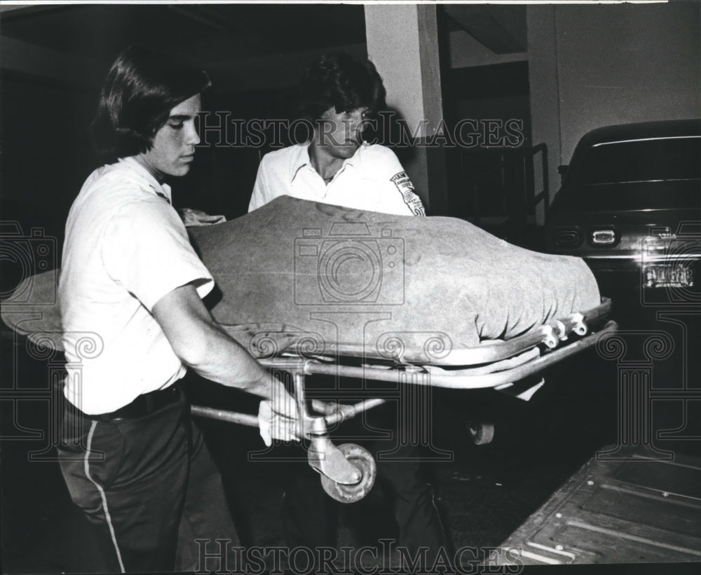 1979 Body Removed from Board of Education Parking Deck to Hospital - Historic Images