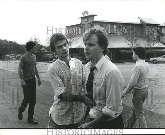 1982 Myron Phillips, helped by employee after Hostage Incident - Historic Images