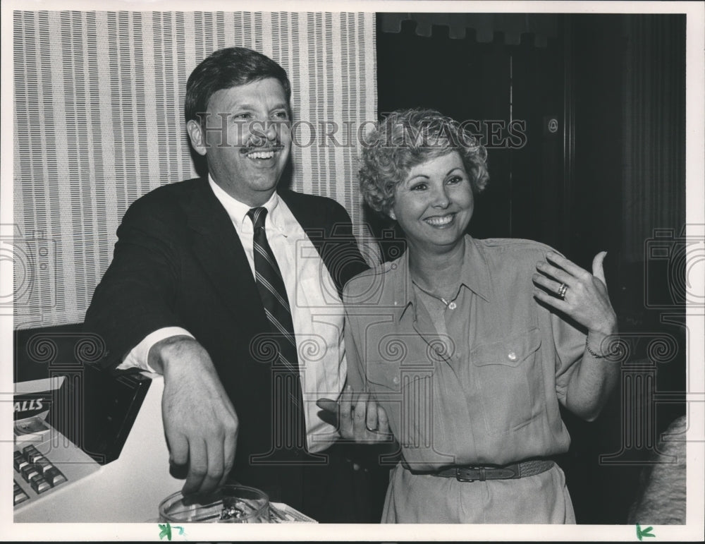 1990 Gary and wife Gayle White jokes with supporters in Homewood - Historic Images