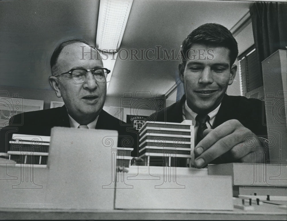 1966, Student Explains Birmingham Transportation Center to ME Wiggins - Historic Images