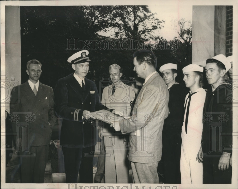 1947, Dr. Ralph Adams of University of Alabama receives Navy plaque - Historic Images