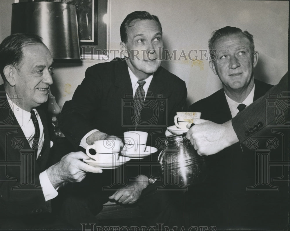 1960, Mortgage banker John Hall and others have coffee in Birmingham - Historic Images