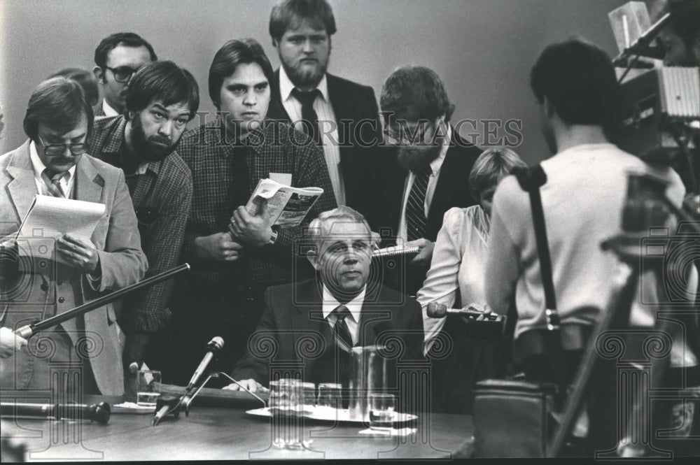 1983, H. Hanley Funderburk with reporters at trustee meeting, Auburn - Historic Images