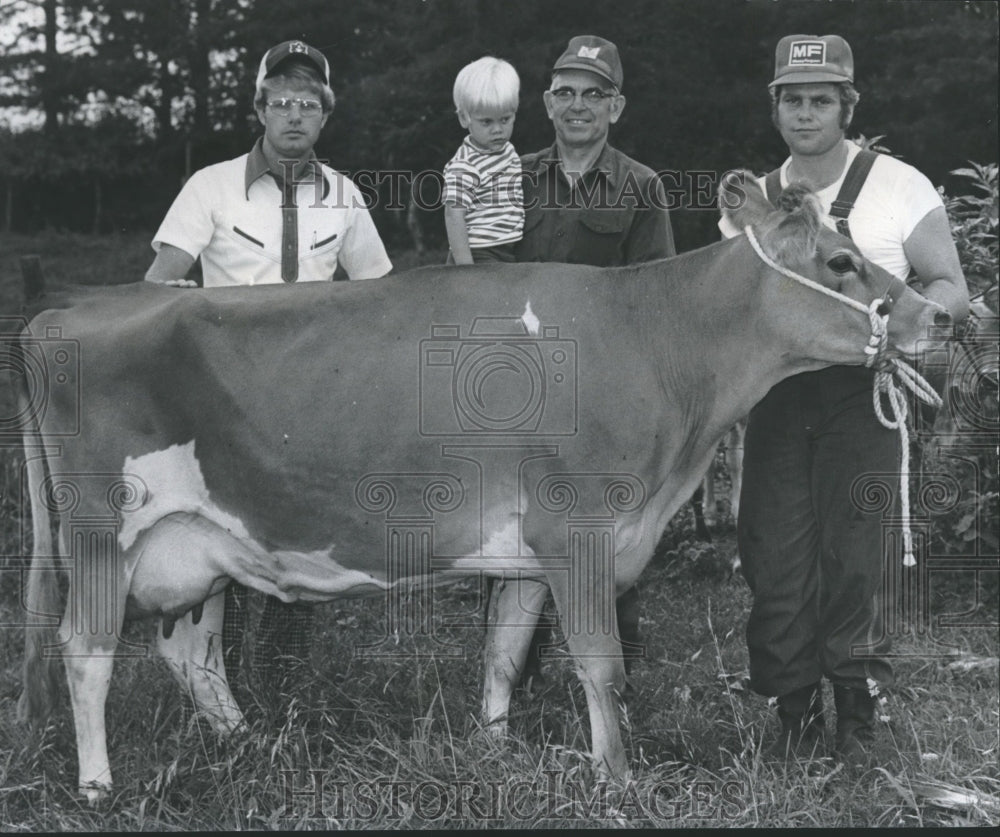 1976, Four-H Club persons with champion cow, "Debbie" Alabama - Historic Images
