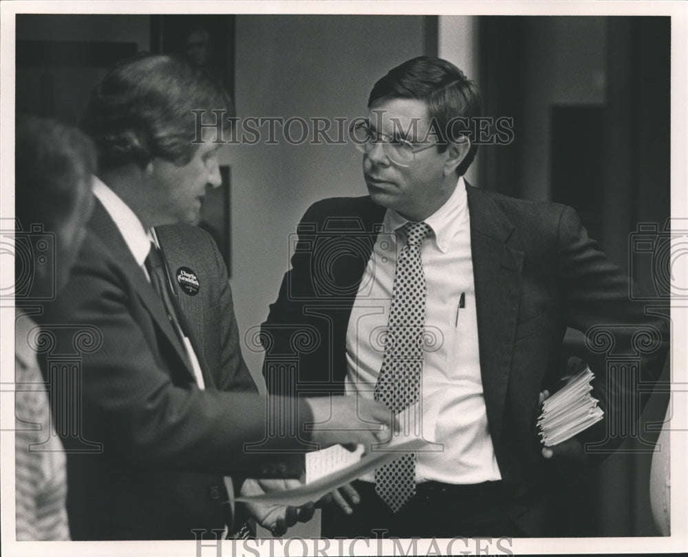 1986, Charles Graddick listening to someone, Dekalb County Courthouse - Historic Images