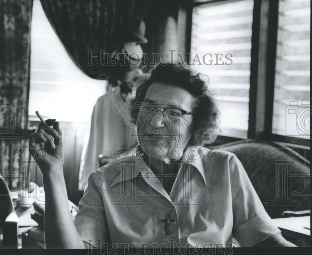 1975, Frances Owen smoking, lighthouse cafe, Alabama Restaurant owner - Historic Images