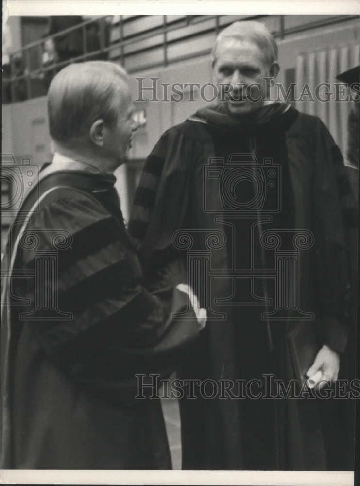 1986 Guy Hunt, with unidentified person, gets degree - Historic Images