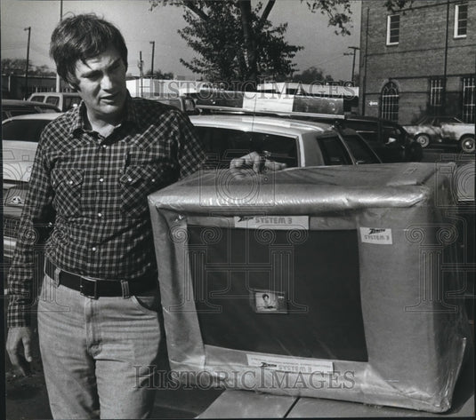 1981 Sergeant Richard Hutchcraft with confiscated television - Historic Images