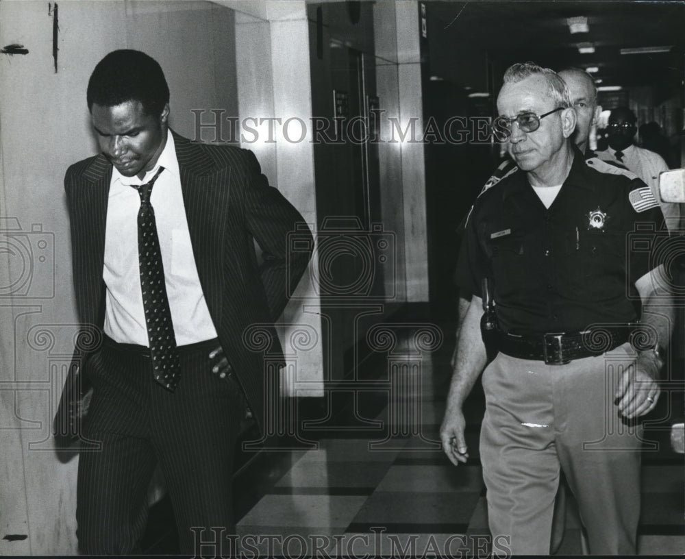 1982 Anthony O&#39;Hara Johnson taken to be sentenced by county deputy - Historic Images