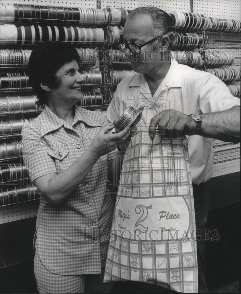 1974 Mitzi&#39;s owners Ike and Mitzi Kronenburg inside store - Historic Images