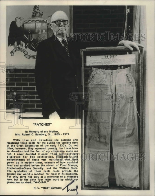 1978 R. C. "Red" Bamberg displays the Work Pants in Frame in Office - Historic Images