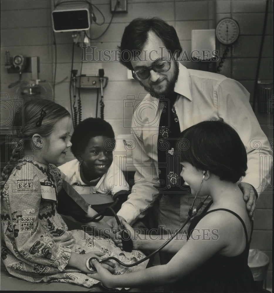 1978 Doctor Gary Decker, Physician, Children playing Doctor - Historic Images