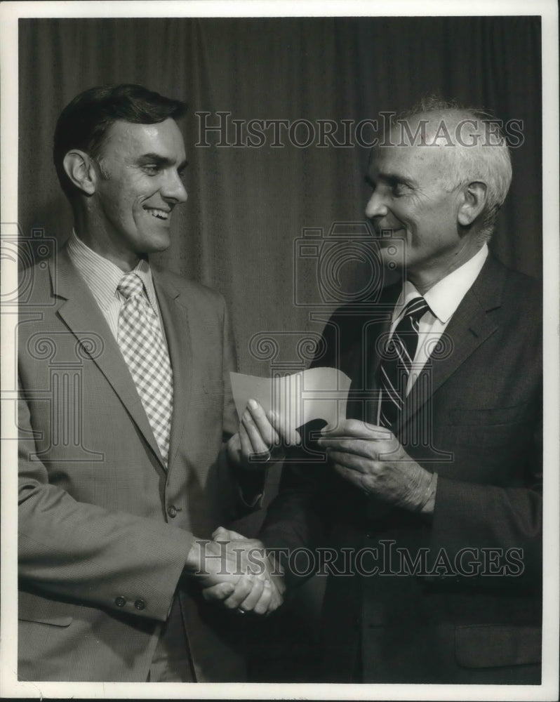 1970 Press Photo Ronald G. Kuerner gives checks to Donald Comer, Junior - Historic Images