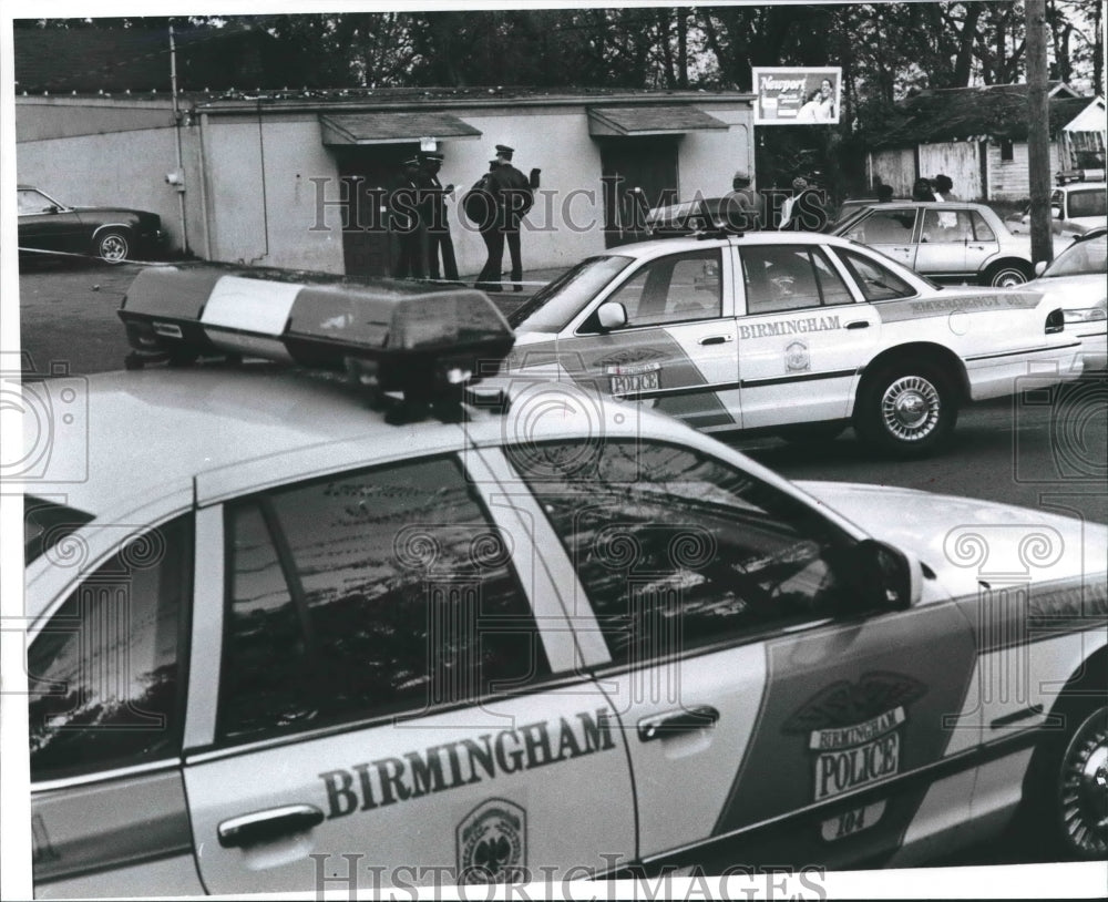 Press Photo Shooting Scene at First Avenue North with Police Cars - abna34157 - Historic Images
