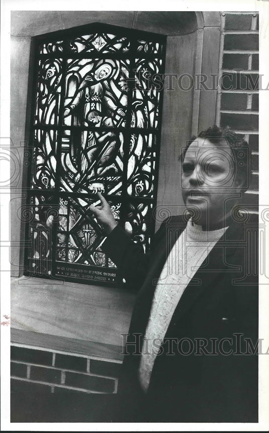 1980, Reverend Charles Horn, Clergyman shows elegant window - Historic Images