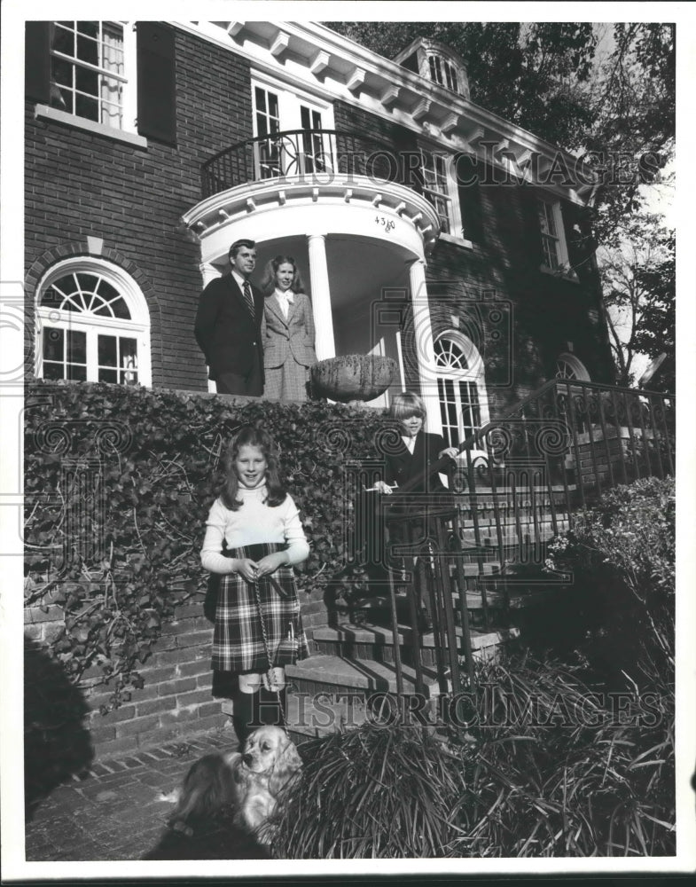 1980 Sam and Carol Frazier and children in front of home - Historic Images