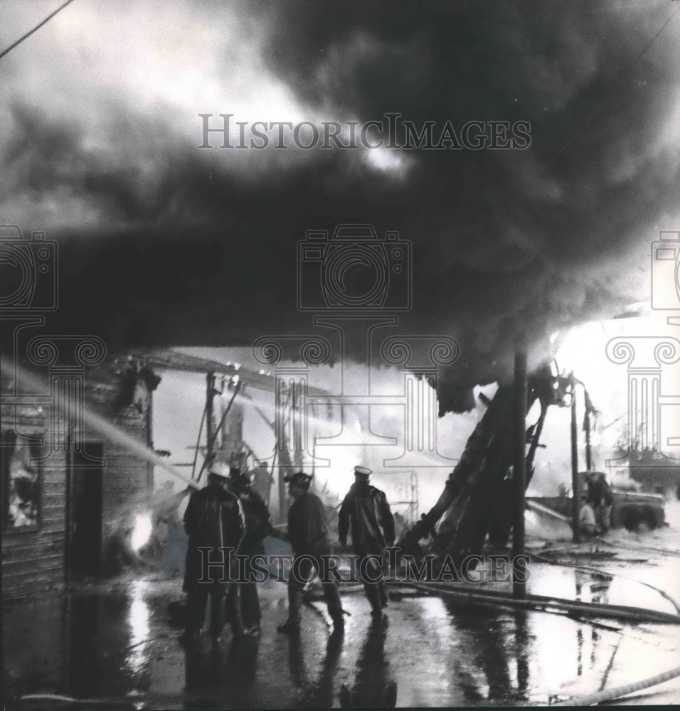 1965, Montgomery Tire Company and Warehouse Fire with Firemen - Historic Images