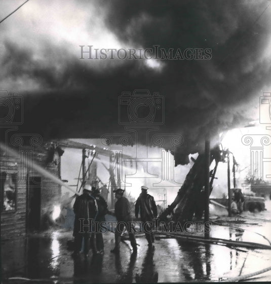 1965, Montgomery Tire Company and Warehouse Fire with Firemen - Historic Images