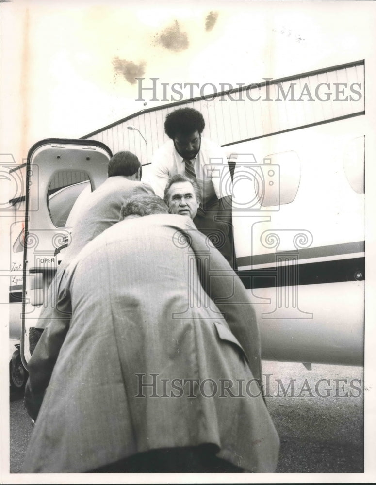 1985, Fourth Term Alabama Governor George Wallace gets in Plane - Historic Images