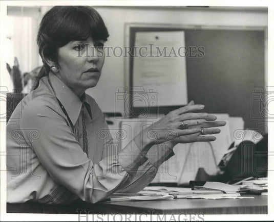 1986, Jackie Gray sitting at desk, Alabama - abna35464 - Historic Images