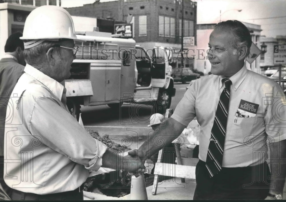 1982 Jack Kartus, politician, shakes hands with Roy Kimberly - Historic Images