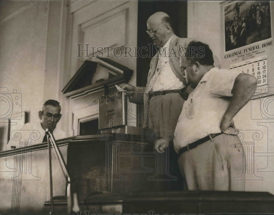 1954, Judge Walter Jones reads names inside Russell County courtroom - Historic Images