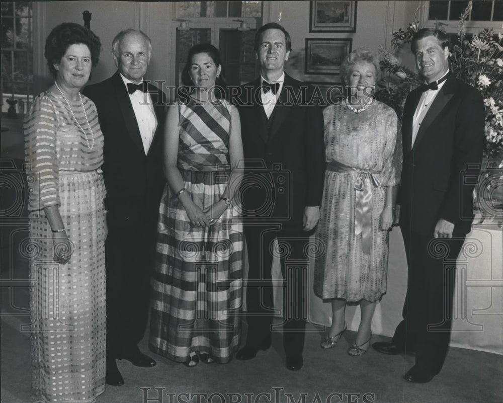 1982, Mr. and Mrs. Jimmy Lee enjoying a party with friends - Historic Images