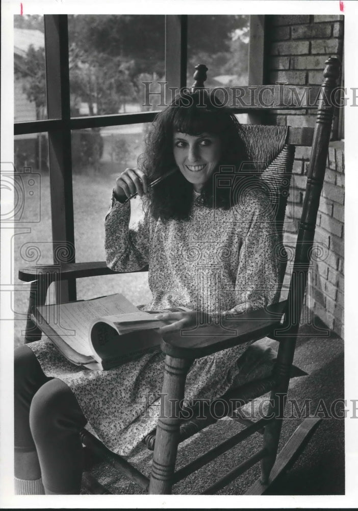 1988 Jamie Lewis has Rare Disease, sits in rocking chair - Historic Images