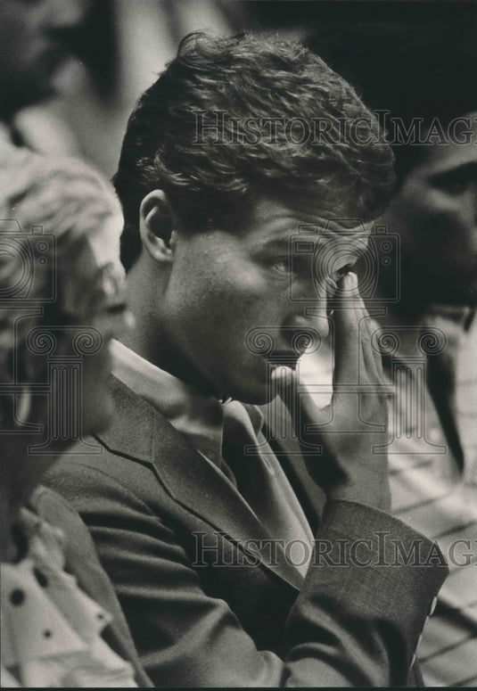 1984, Chuck Leonard wipes a tear while jury's decision is read - Historic Images