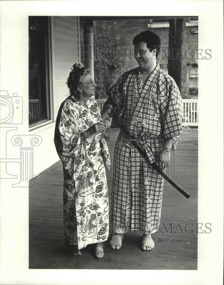 1983, Malcolm McRae and Mrs. Cobb in Japanese costume - abna36383 - Historic Images